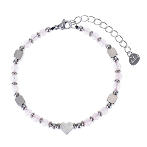 Detail of pink beaded bracelet with stainless steel heart pendant and lobster clasp