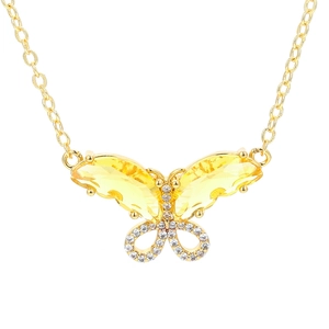 Elegant gold bow necklace with vibrant yellow zircon crystals on a delicate chain