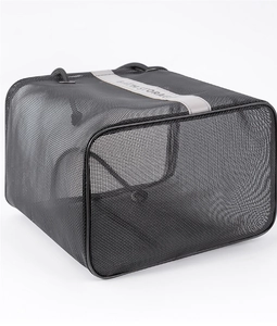 Macro view of black mesh shower caddy featuring gray strap with Bath Storage text