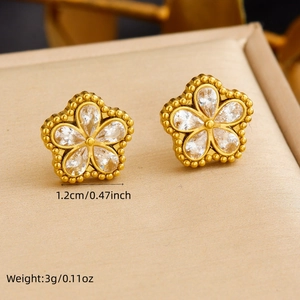 Fashionable gold plated stainless steel flower stud earrings with clear crystals