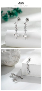Détail macro de la boucle d'oreille en zircon géométrique avec pendentif en forme de cerf-volant