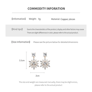 Detailed size specifications and weight info for 14k gold plated snowflake drop earrings