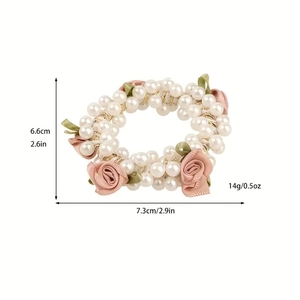 Pink rose flower hair scrunchie with white pearls and size measurements on white background
