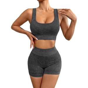 Women's ribbed athletic set with shockproof sports bra and high-waisted shorts