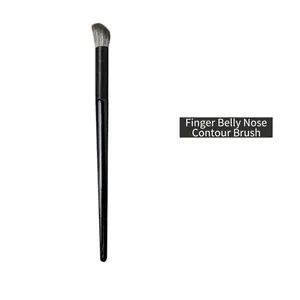 Angled nose shadow brush with finger-shaped synthetic bristles and black handle
