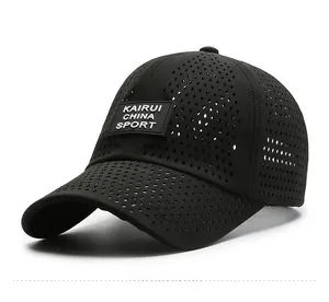 Close-up of black mesh breathable sun hat with rectangular KAIRUI rubber patch logo