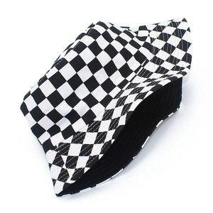 Close-up of high-quality black and white checkerboard pattern on a stylish bucket hat