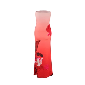 Detail of pink to red gradient strapless dress with large red floral print on the hem