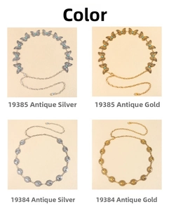 Detail of vintage metal waist chains with butterfly and embossed round turquoise pendants