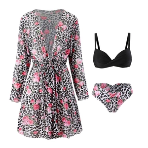 Detail of three-piece bikini set with leopard rose print and long sleeve cover-up