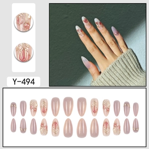 Cat eye press-on nails with 3D tulip flowers and metallic gold trim almond shape