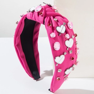Pink fabric knotted headband with crystal gemstones and heart arrow metal charms
