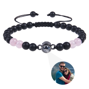 Detail of beaded photo projection bracelet with matte stones and adjustable woven cord