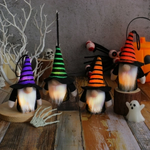 Light-up Halloween faceless gnomes with striped hats on a festive spooky background