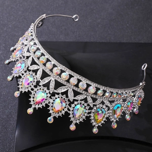 Detailed macro view of silver wedding crown with iridescent colorful teardrop gems