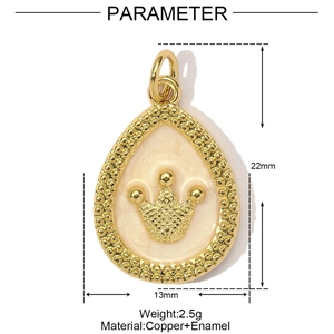 Detail view of 22mm x 13mm crown pendant in gold copper with cream enamel finish