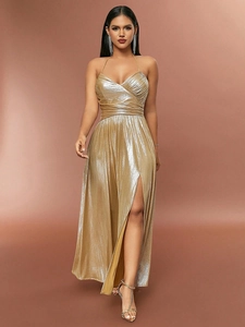 Sultry gold metallic pleated halter maxi dress with a high slit and glossy finish