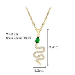 Titanium steel gold snake necklace with green eye and zircon pavé on white background