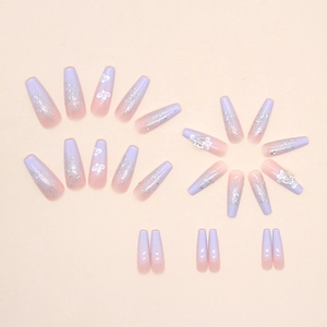Long coffin press-on nails with blue-pink gradient, silver glitter, and white floral art