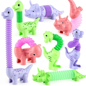 Colorful dinosaur pop tube toys with flexible telescopic bodies in pink, purple, and green
