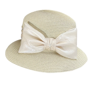 Elegant French style beige straw sun hat with a large cream silk bow for women