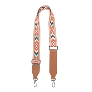 Detail of bohemian geometric pattern strap with leather trim and metal swivel hooks