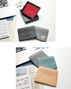Close-up of slim PU leather card holders in multiple colors for office business use