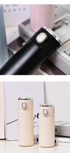 Detail view of large capacity stainless steel thermal bottles with smart temperature display