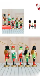 Set of five 13cm wooden Christmas nutcrackers with gold hanging strings and festive details