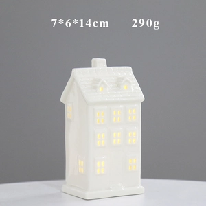 Ceramic house ornament with LED light, hollow design, 7x6x14cm size and 290g weight