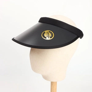 Detail of wide-brim black UV sun visor showing UPF 50+ fabric and reinforced knit edging