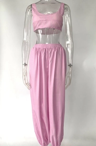 Close-up of pink striped lounge set with elastic waistband and ribbed cuffs