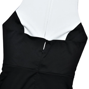 Close-up of the back detail on a halter neck dress with contrast colors and hidden zipper
