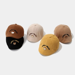 Detail of five multi-color corduroy berets featuring lovely bear embroidery for toddlers
