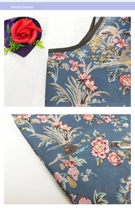 Detail of floral bird pattern and durable dark piping on high-capacity shopping bag