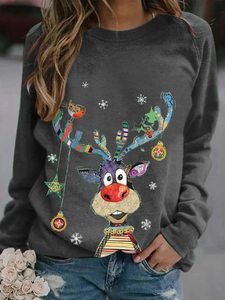 Detail of Christmas reindeer print on long-sleeved dark gray crewneck sweatshirt