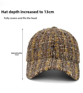 Detail of tweed baseball cap showing textured woven fabric and 13cm crown depth