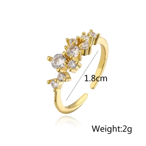 Macro detail of gold plated zircon geometric open ring with 1.8cm diameter and 2g weight