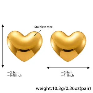 Detail of 3D puffy heart earrings in gold plated stainless steel with size dimensions
