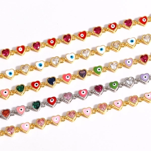 Colorful Evil Eye heart bracelets with gold and silver bases featuring zircon stones