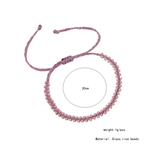 Detail of purple woven rice bead bracelet showing 30cm adjustable slide knot closure