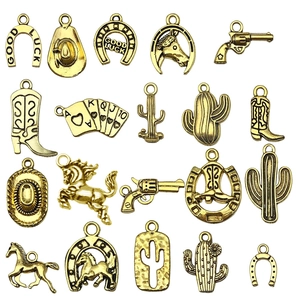 Set of 18 golden Western cowboy alloy charms featuring hats, boots, and cactus shapes