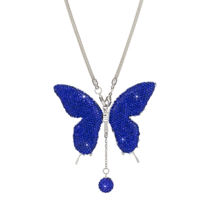 Close-up of sparkling blue rhinestone butterfly car ornament with silver metal chains