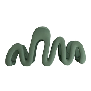 Modern wave-shaped dark green matte hair claw clip with a minimalist curved design