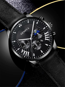Close-up of Geneva men's quartz watch with black leather strap and chronograph dial