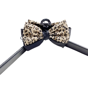 Large leopard print bow hair claw clip for elegant women hairstyles on white background