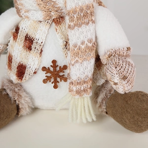 Christmas snowman plush doll with knit scarf and brown fur boots for holiday table decor