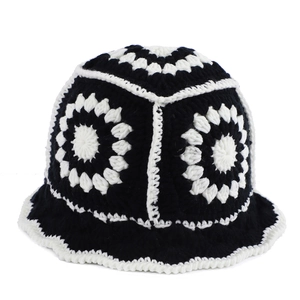 Handmade crochet bucket hat with vintage black and white floral pattern for women