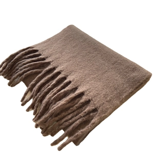 Thick solid brown mohair scarf with fringe tassels for women in cold winter fashion