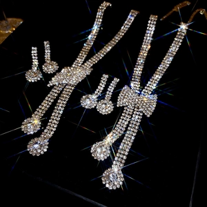 Luxury rhinestone bow necklace and earrings jewelry set in shimmering silver finish